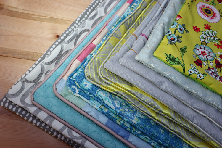 Throw pillow covers one on top of the other